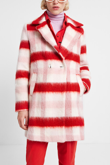 Manteau en laine à double boutonnage.
