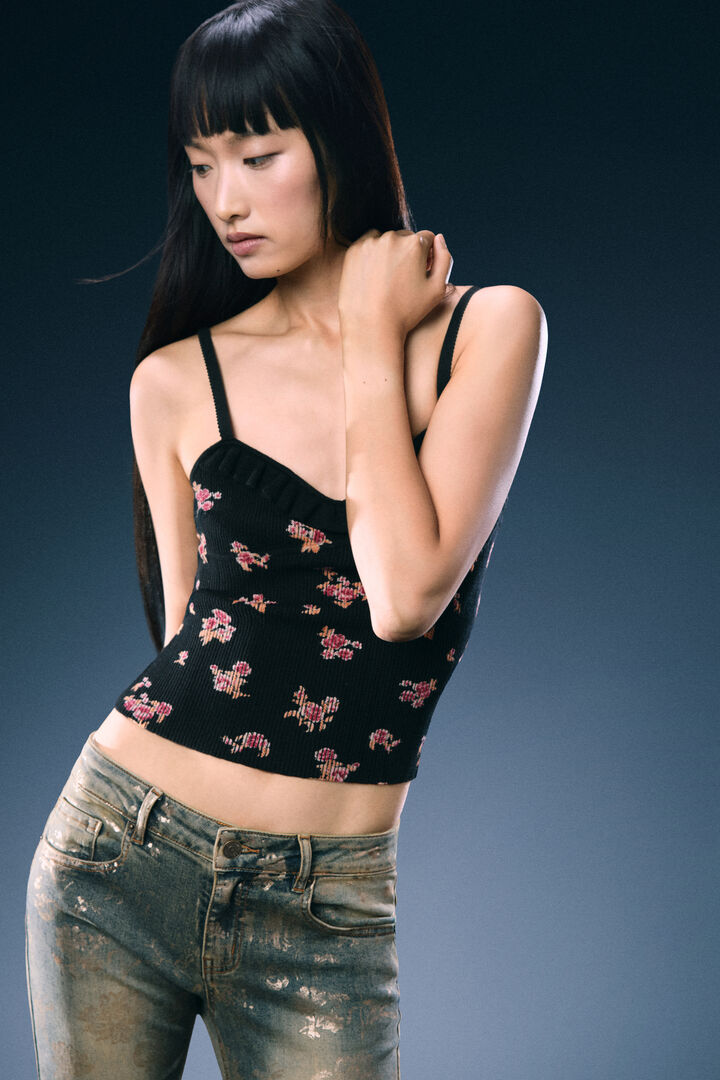 Shiny effect flare jeans