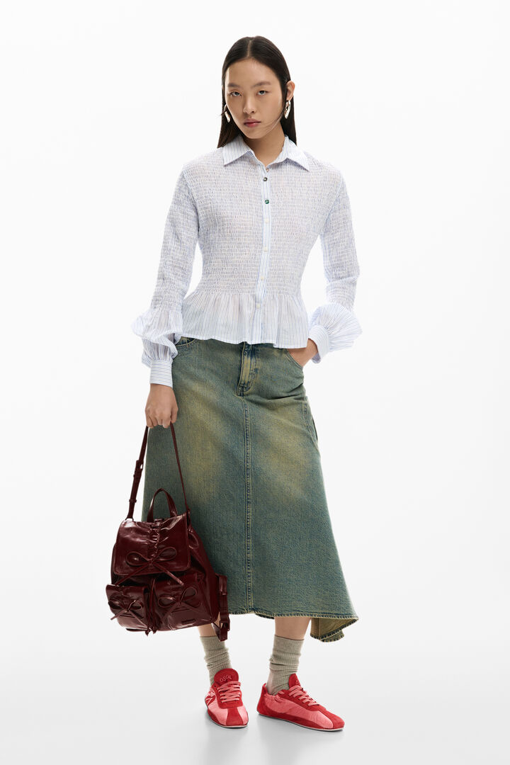 Small shiny backpack with bow | Desigual