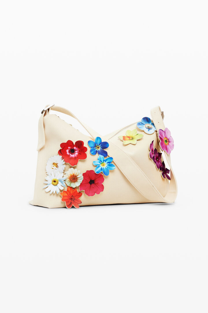Convertible pants with flowers Tyler McGillivary | Desigual