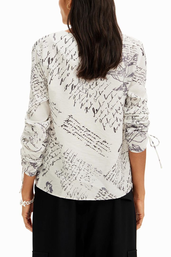 Blusa textos mangas ajustables | Desigual