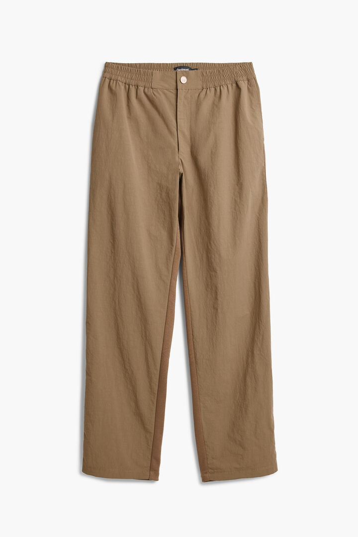Long mixed-fabric trousers