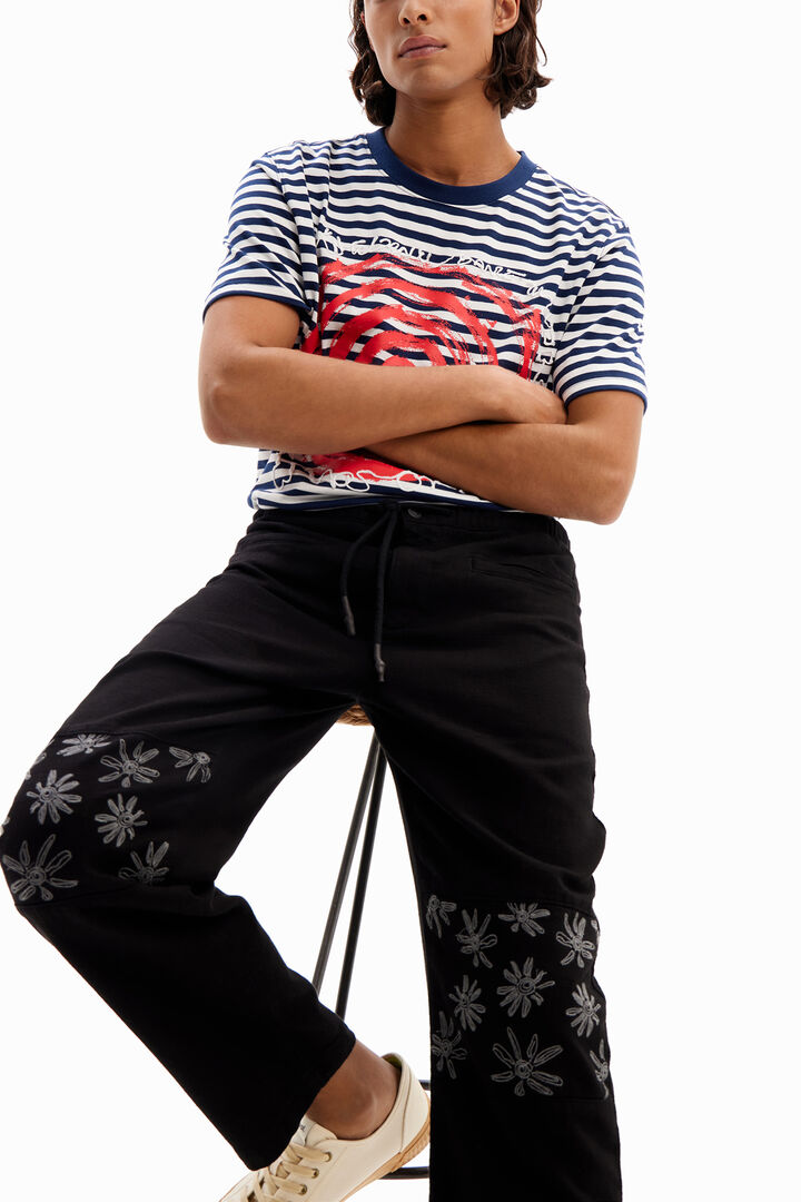Trousers with floral details | Desigual
