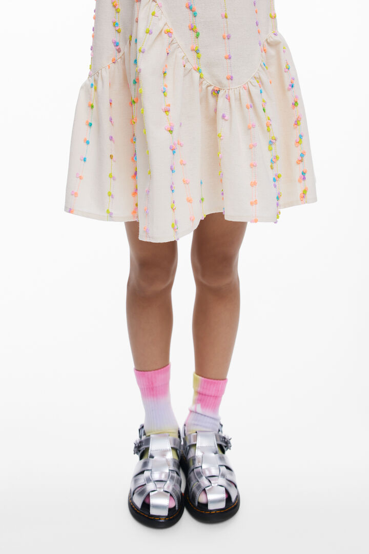 Dress with straps and pompoms | Desigual