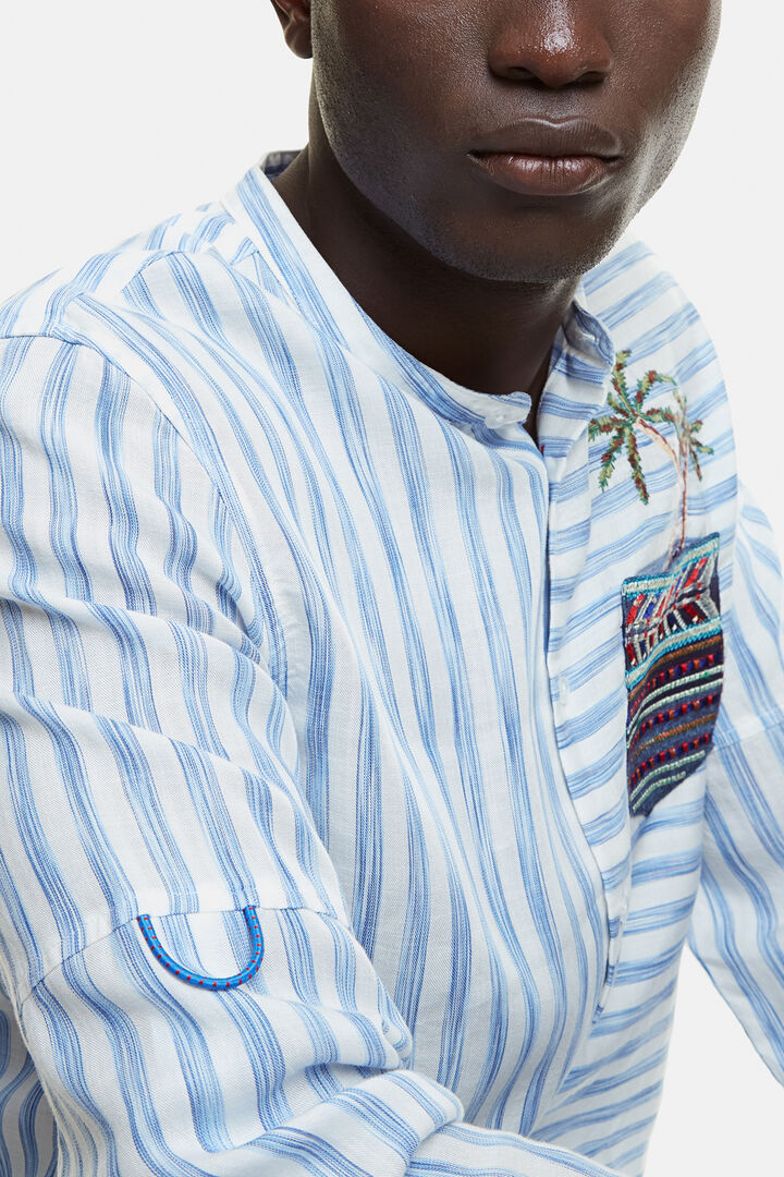 Camisa eco a rayas con escudo y palmera | Desigual