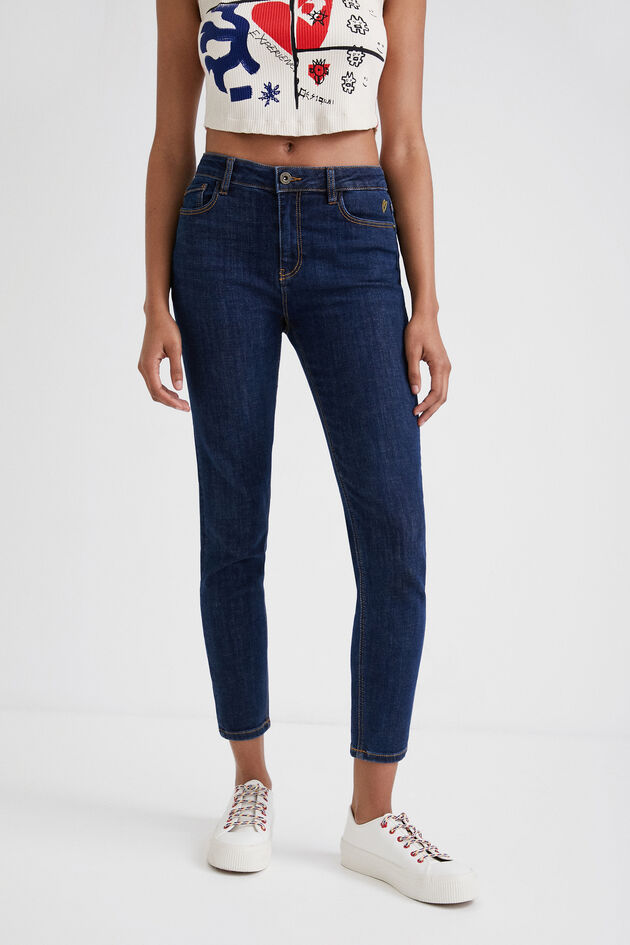 Enkellange skinny jeans