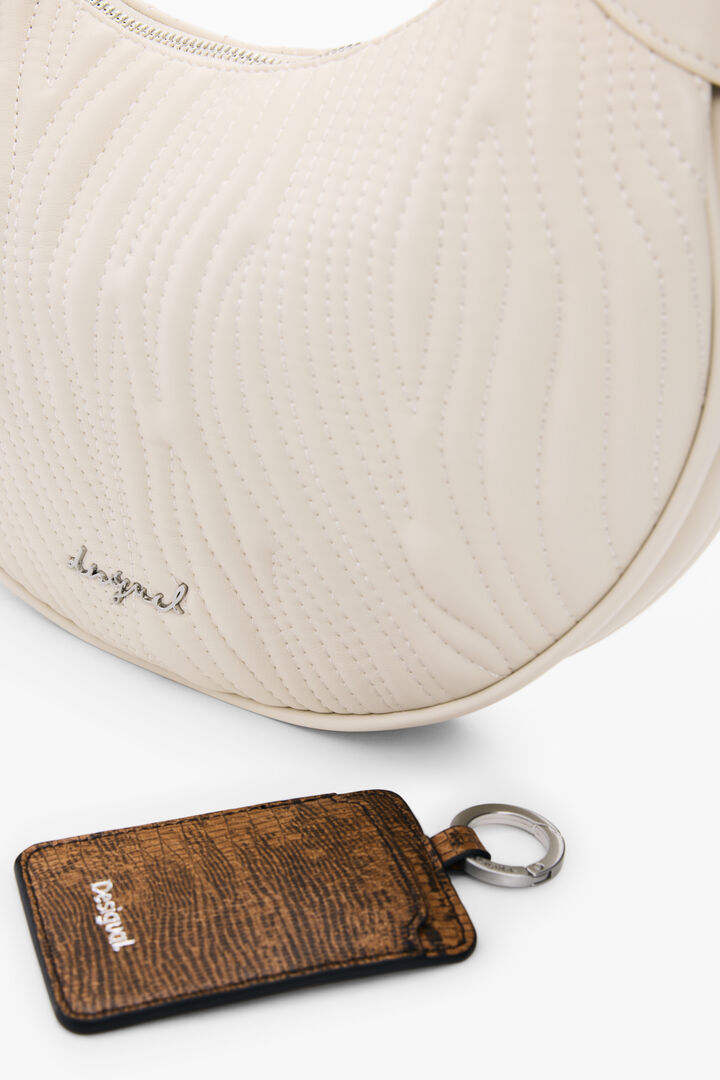 Medium oval bag with engravings | Desigual