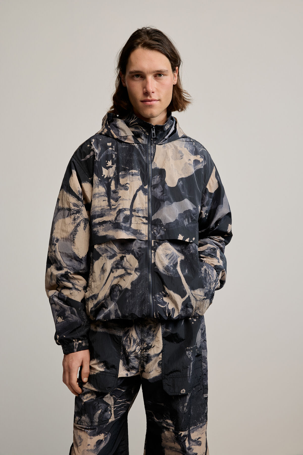 ゴーギャン柄のジャケット グレー メンズ I Desigual.com
