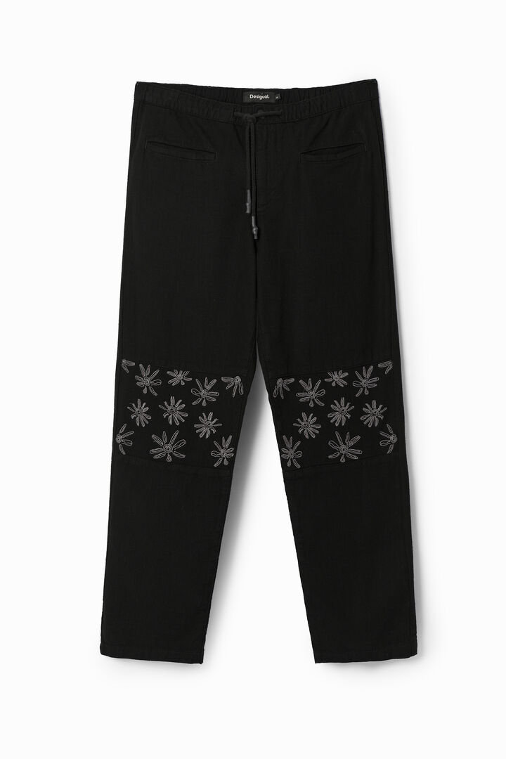 Trousers with floral details
