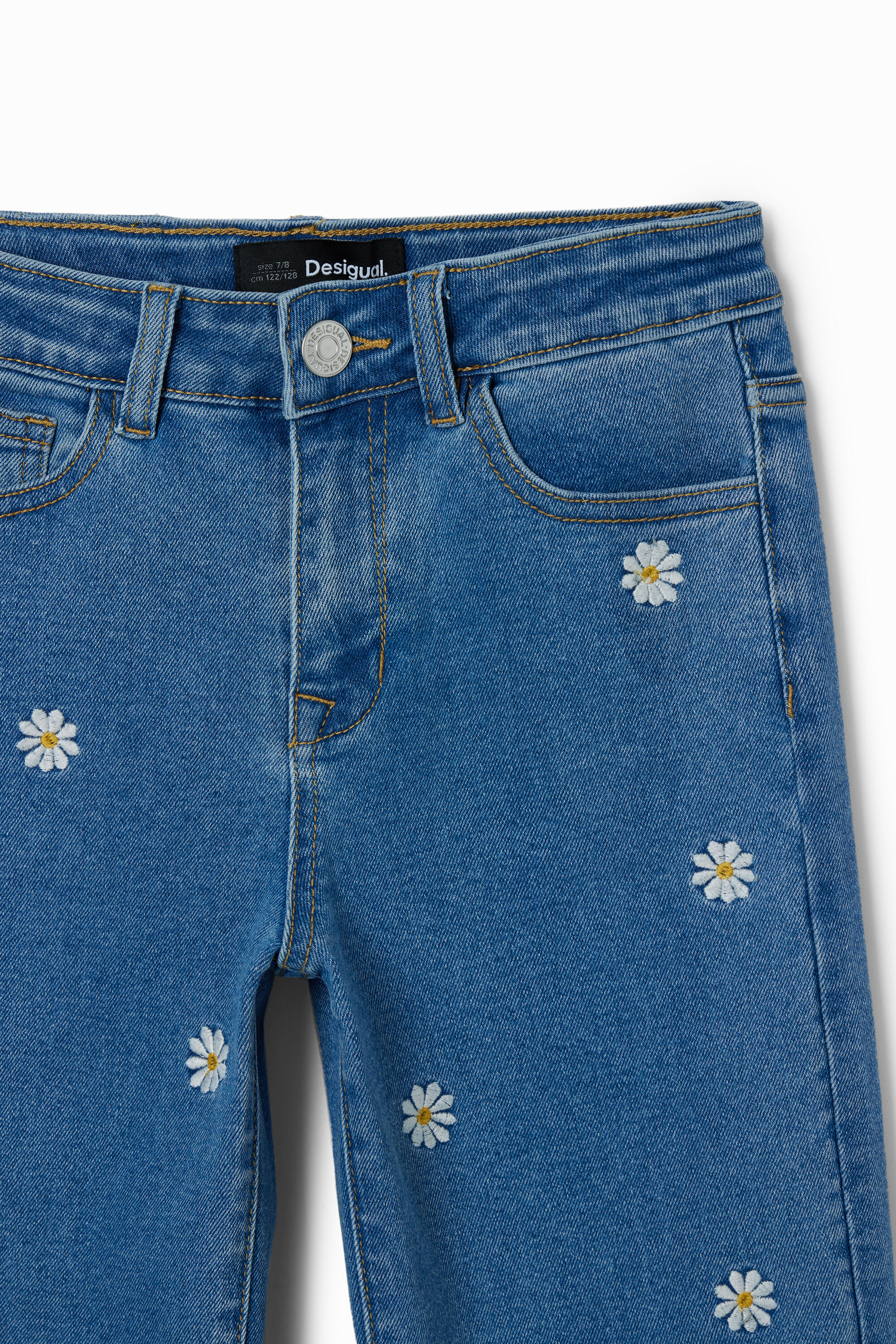 Daisy embroidered jeans on sale