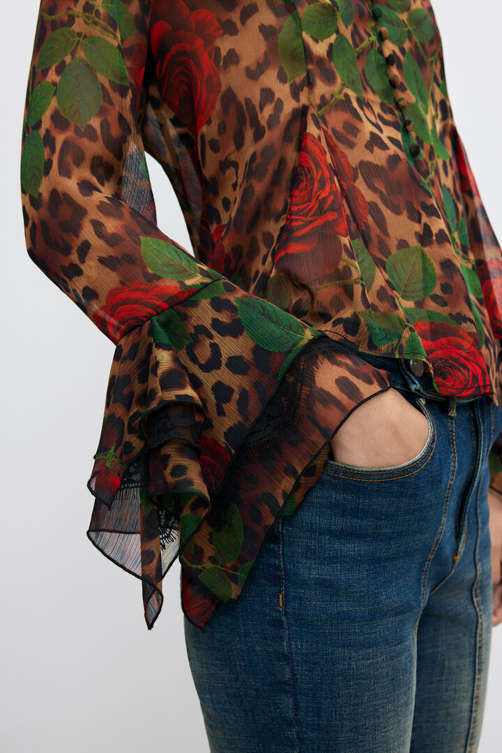 long-sleeved floral blouse