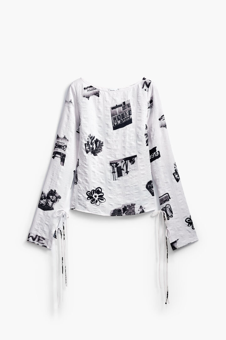 Textured blouse with bows