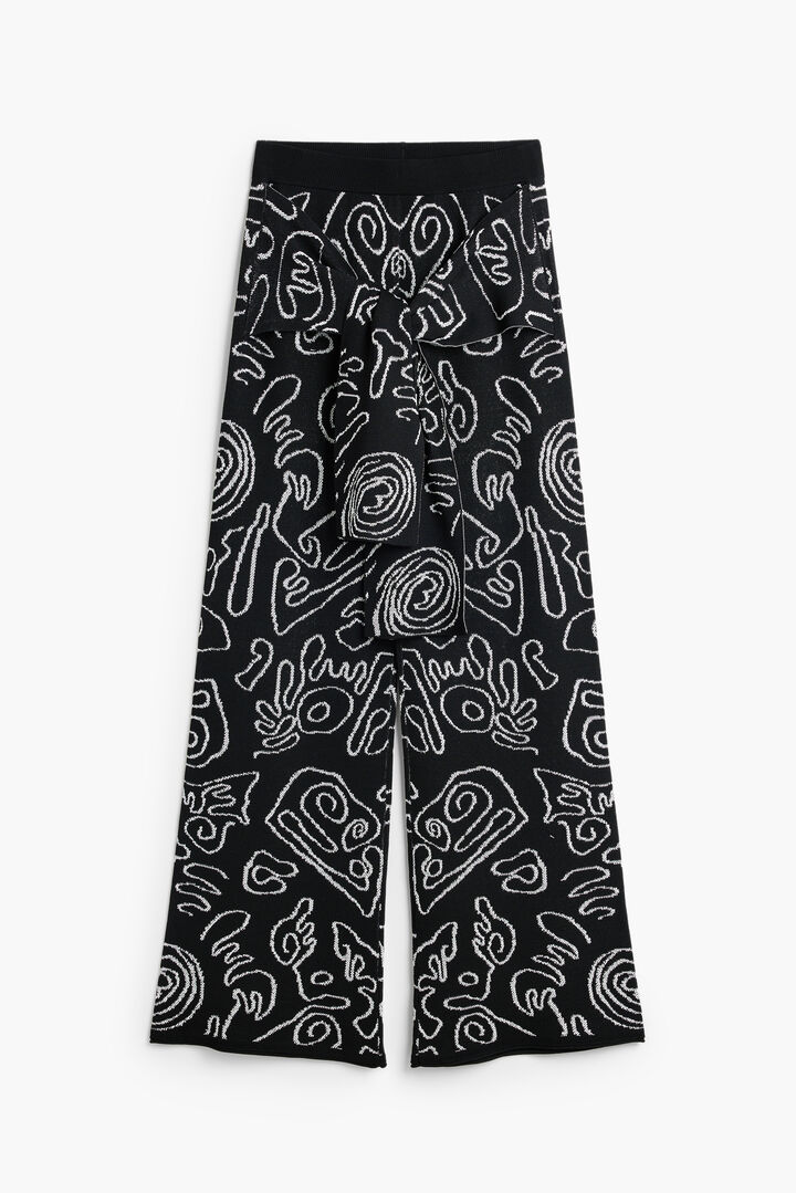 Cal&ccedil;a em malha jacquard