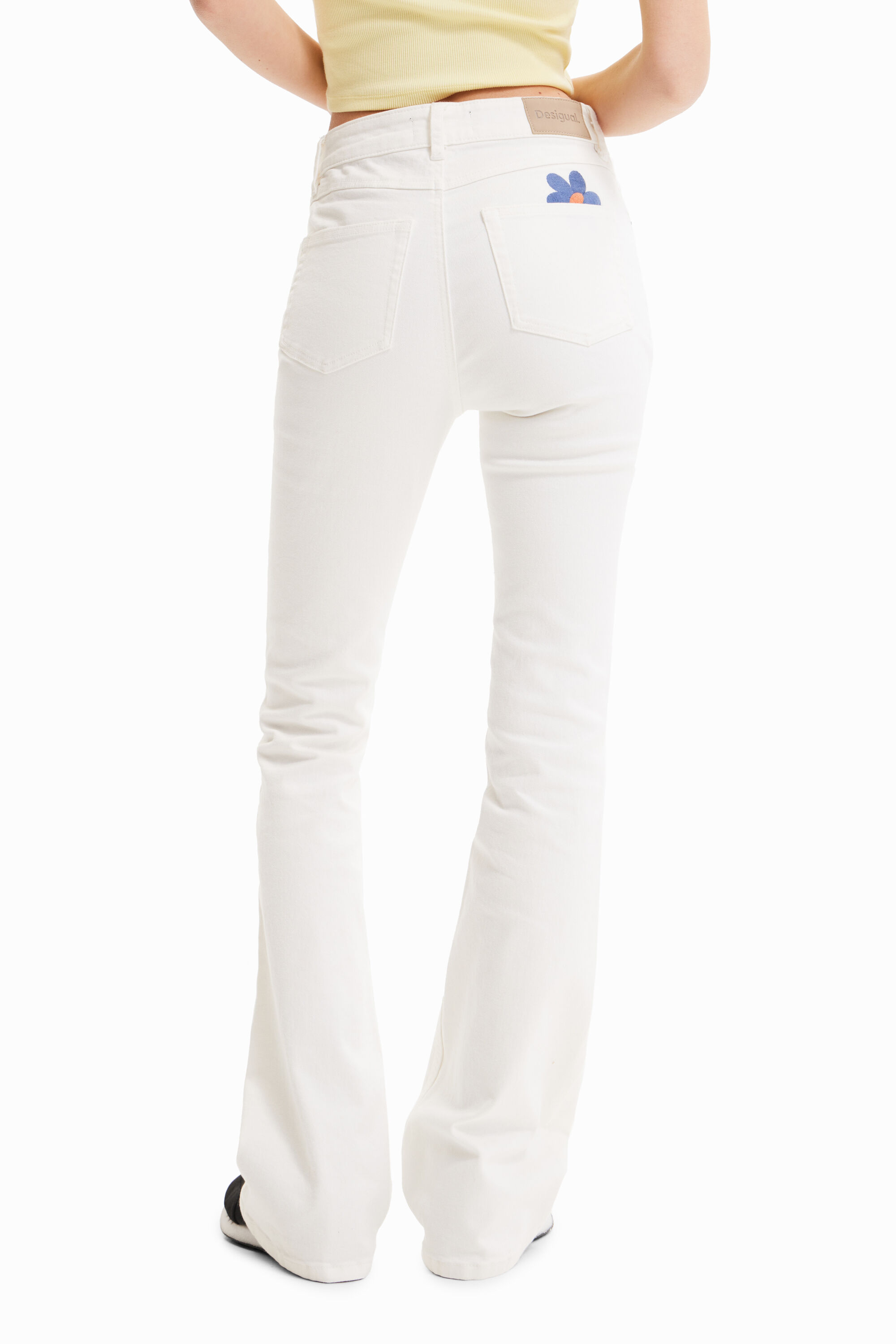 Shop Desigual Long Flare Jeans In White