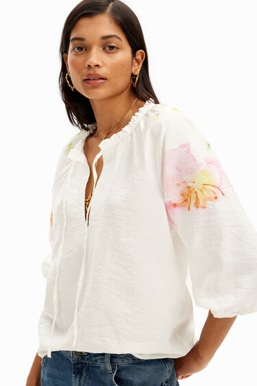 Flowy blouse with watercolor floral print. | Desigual