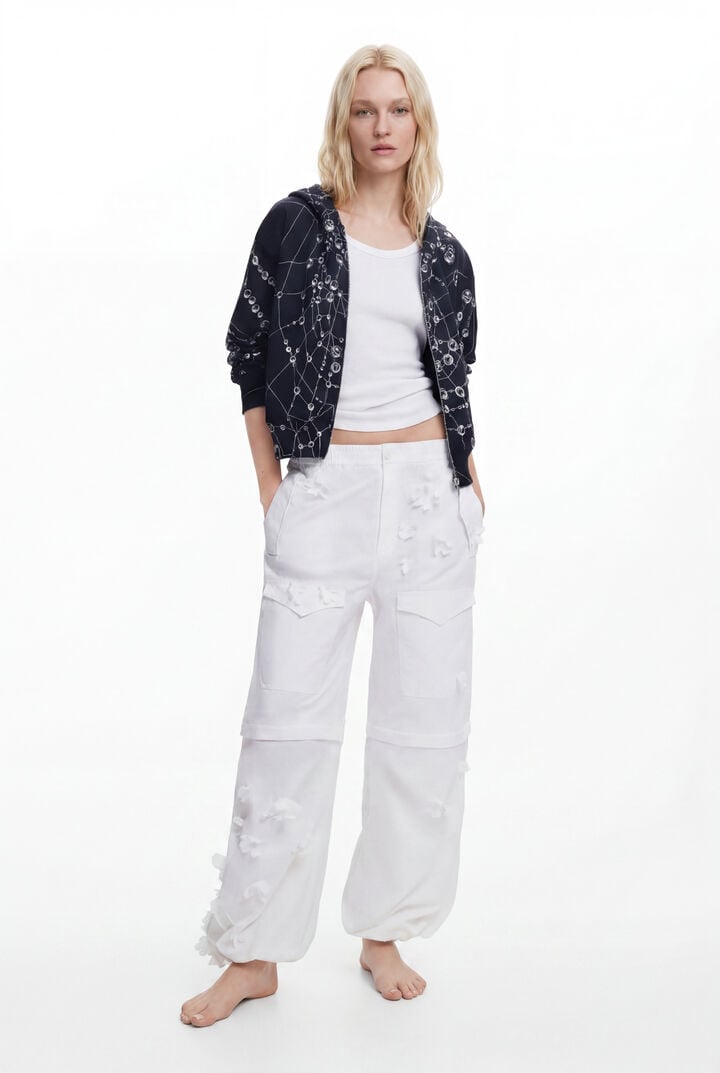 CONVERTIBLE PANTS WITH FLOWERS TYLER MCGILLIVARY