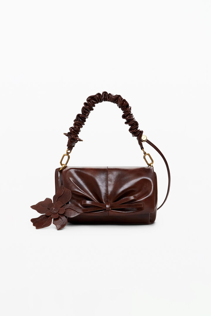 Small shiny floral bag