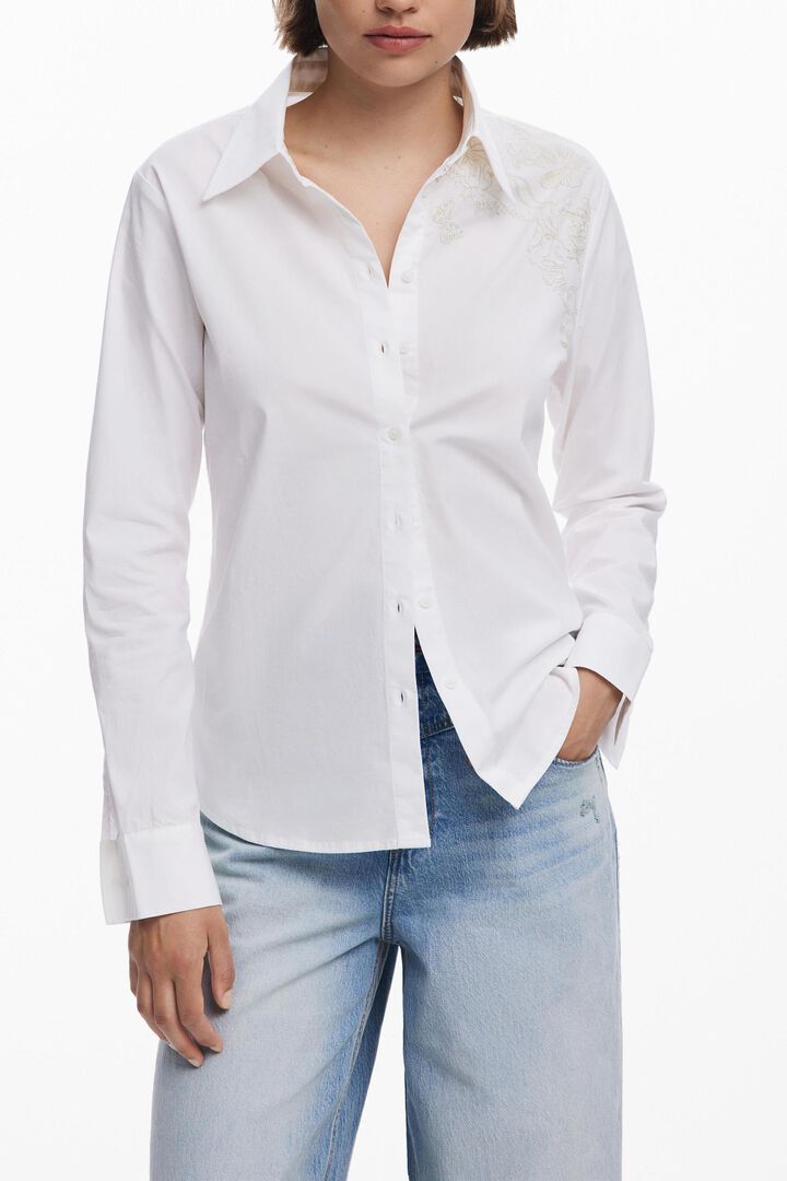 Plain shirt with embroidery