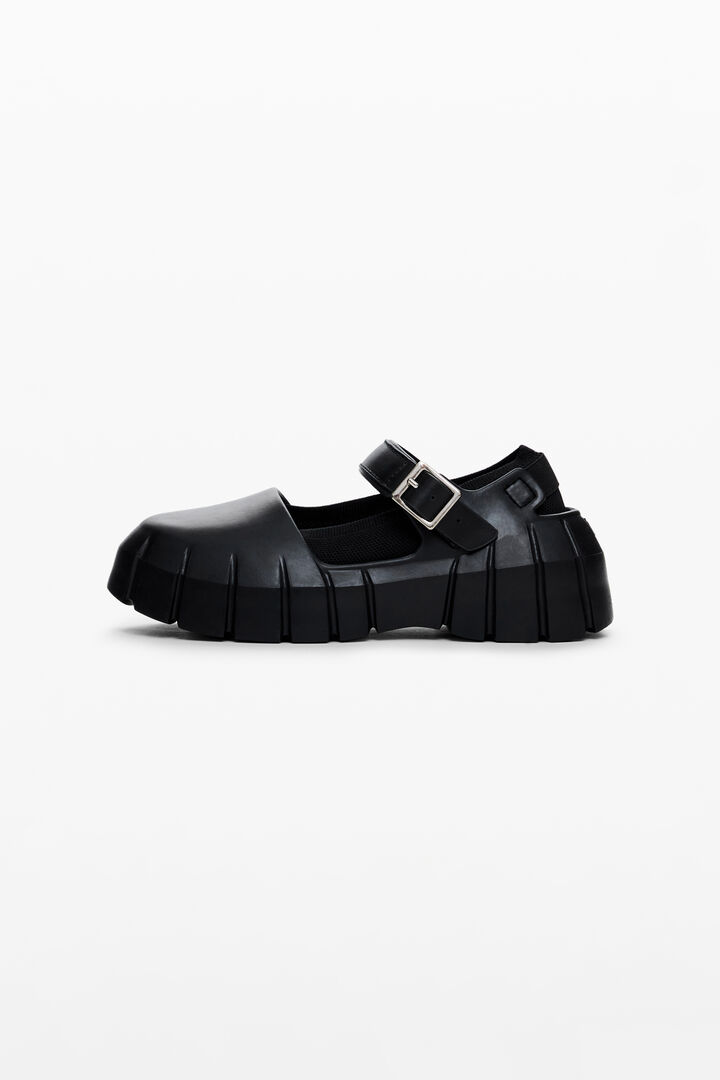 Ballet flat with side release closure