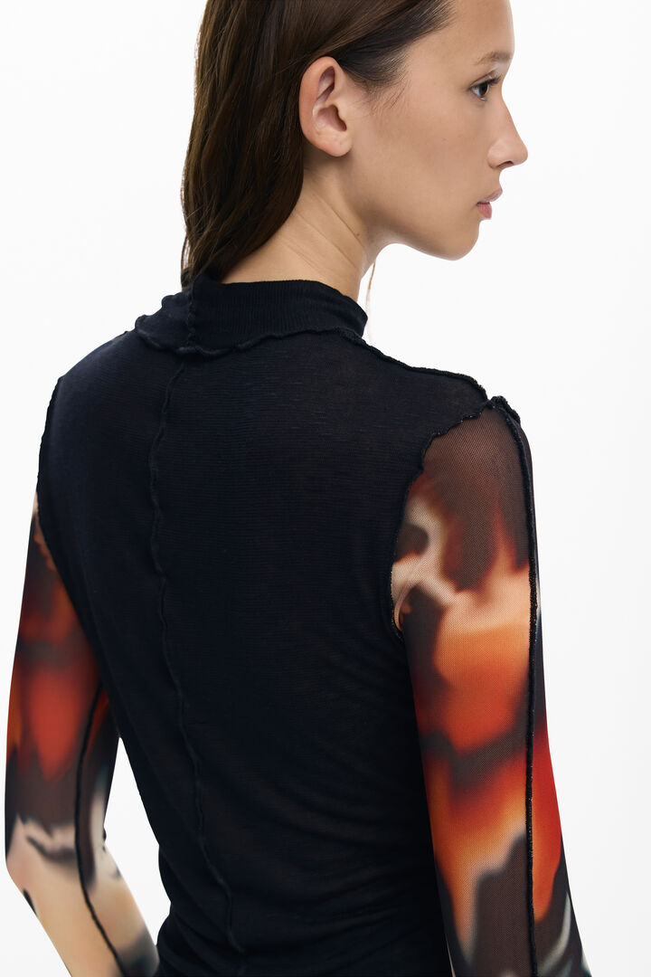 Camiseta mangas transparentes | Desigual
