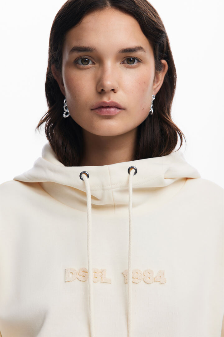 Oversized sweatshirt with sleeve slits | Desigual