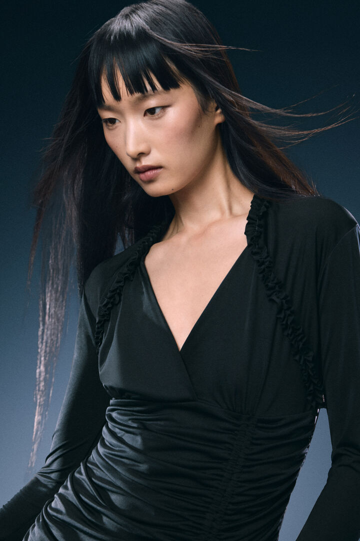 asymmetric dress with flared sleeves