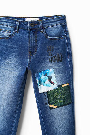 Jeans with photographic patches | Desigual