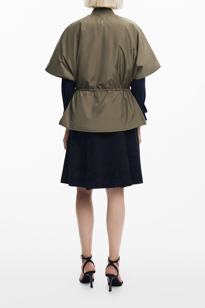 Adjustable nylon poncho