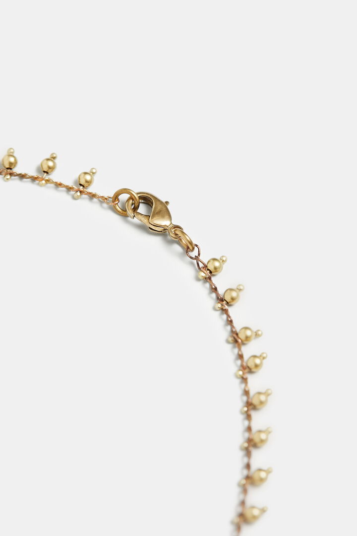 Long golden necklace charms | Desigual