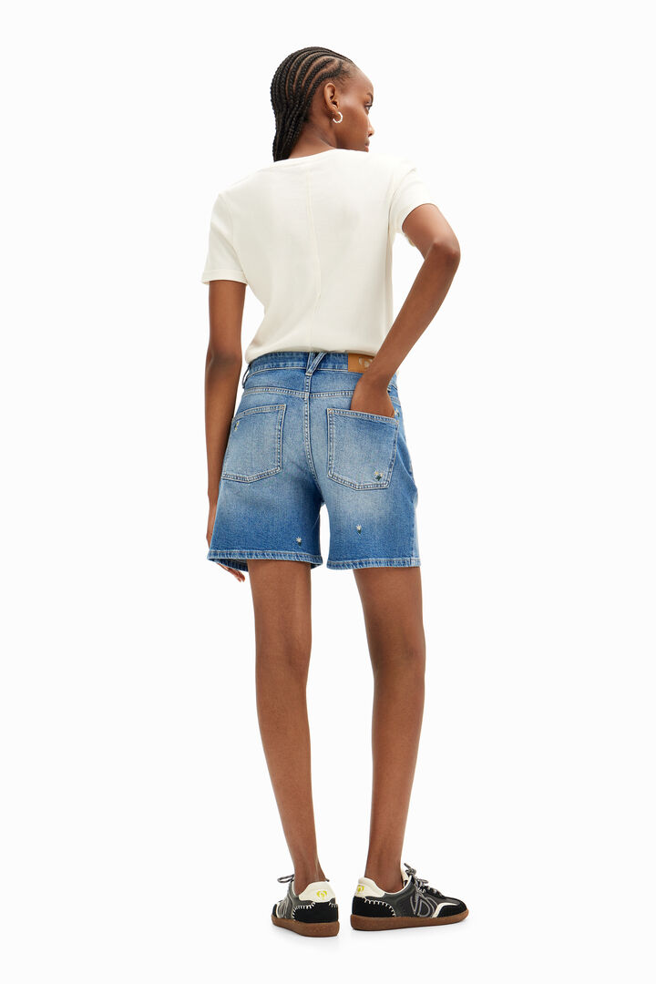Pantalones shorts denim con pequeños dibujos de flores | Desigual