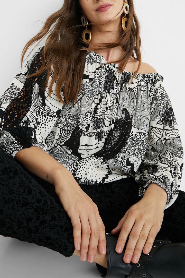 Blusa blanca y negra encaje mangas | Desigual