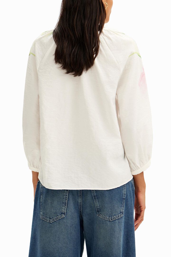 Flowy blouse with watercolor floral print. | Desigual