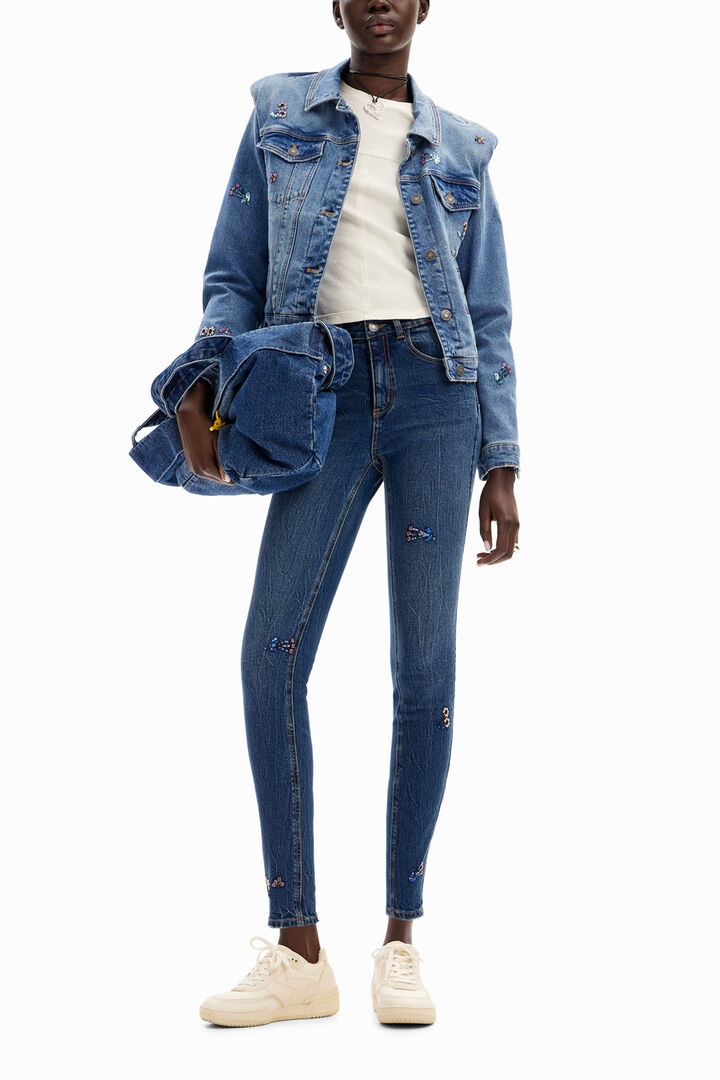 Jean slim perles fleurs | Desigual