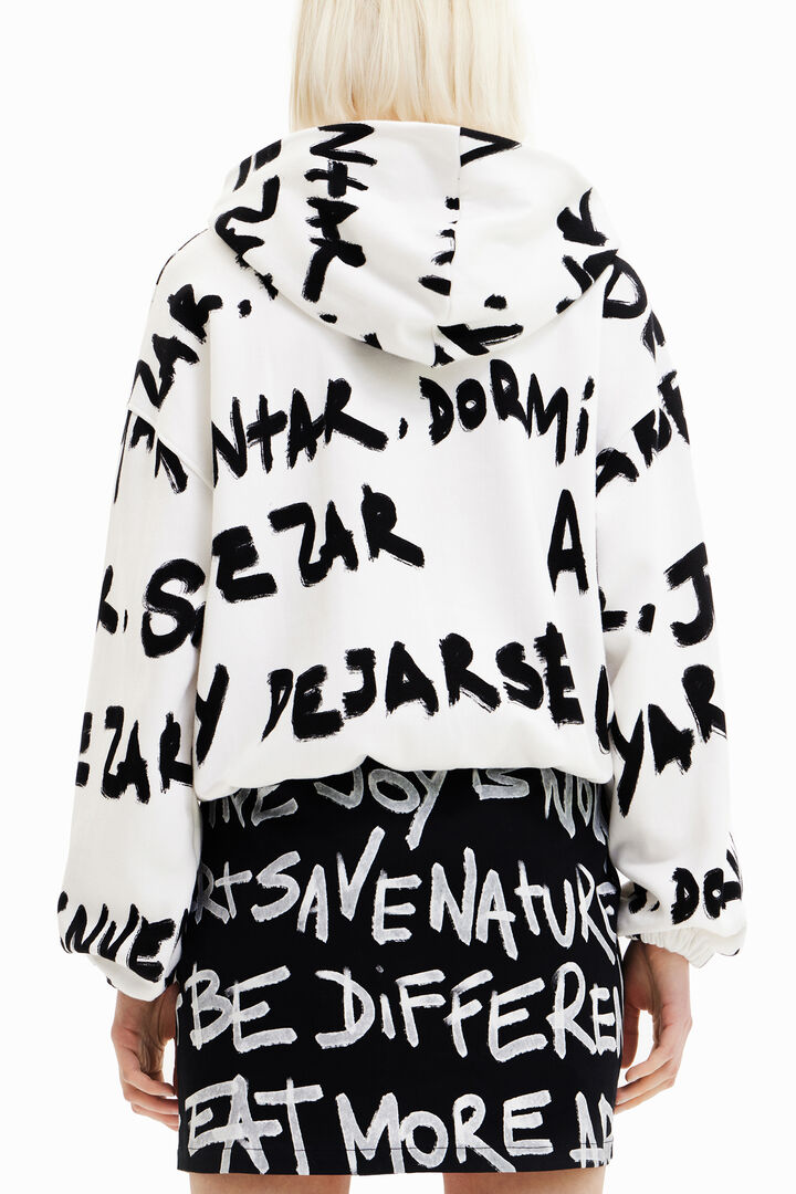 Dessuadora oversize text Manifesto all-over | Desigual