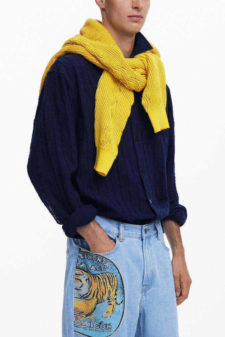 Pantalons texans amb pegats | Desigual