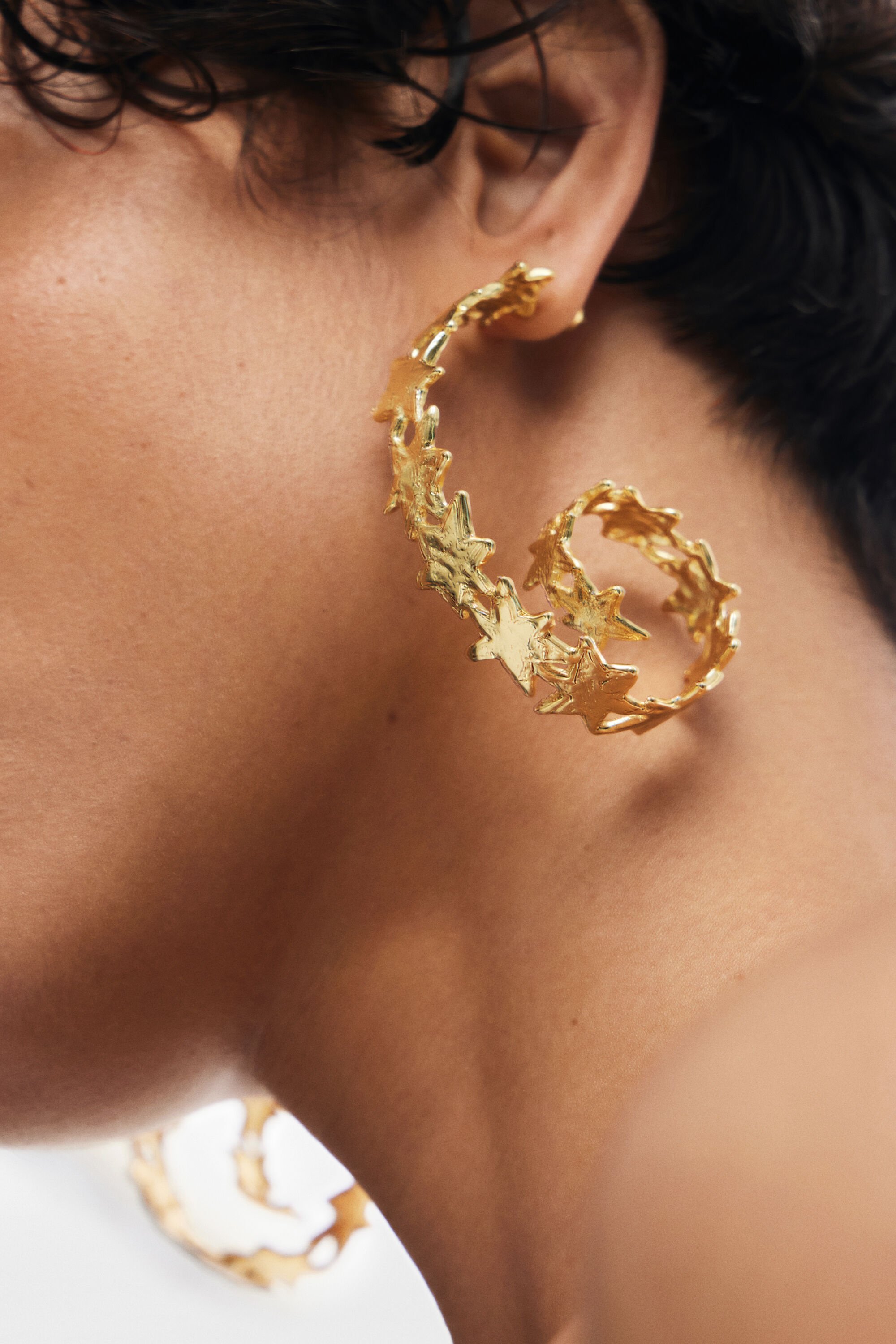 Zalio gold plated spiral star earrings