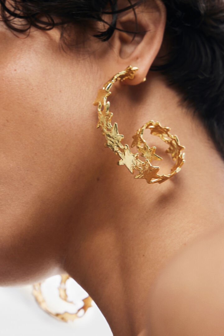 Pendientes espiral estrellas baño oro Zalio | Desigual