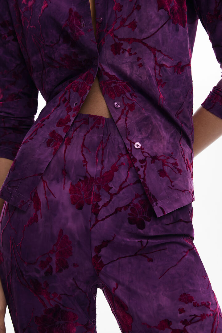 Flared textured fluid pants | Desigual
