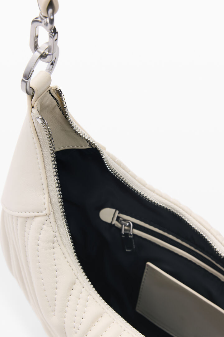 Medium oval bag with engravings | Desigual