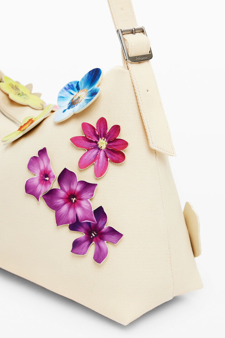 Convertible pants with flowers Tyler McGillivary | Desigual