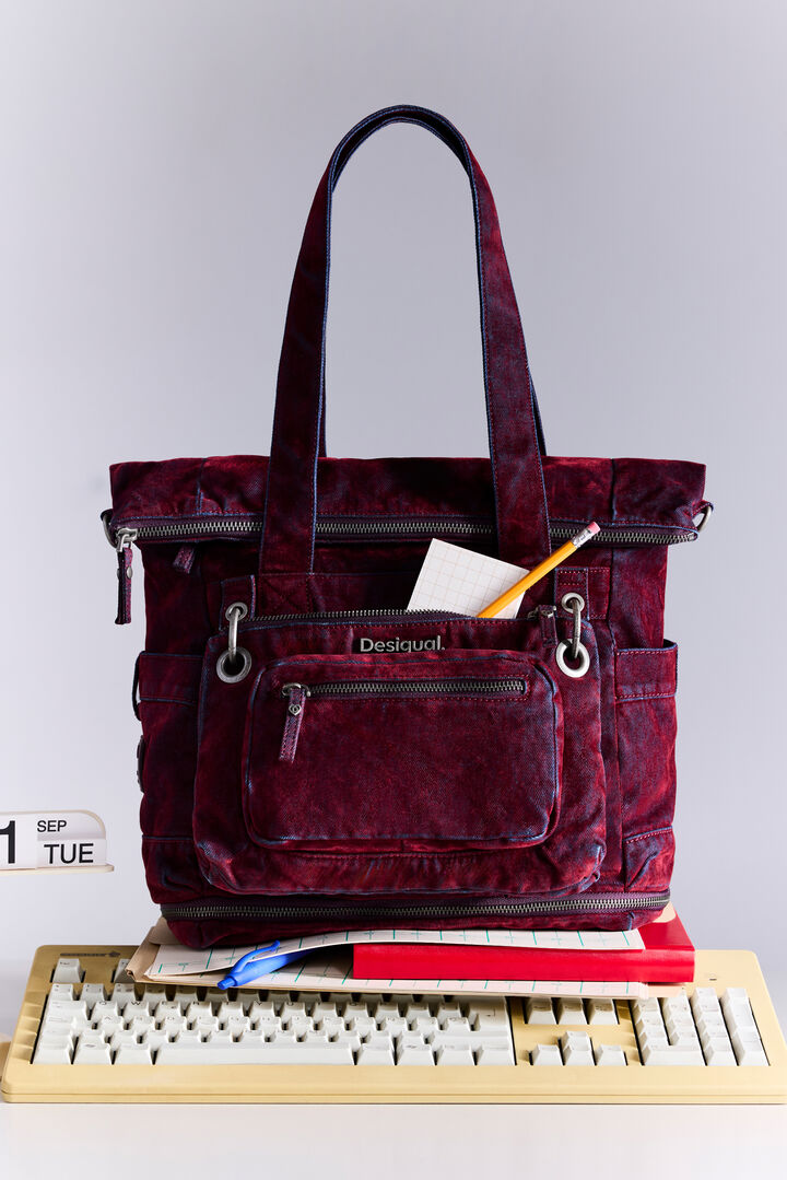 large multi-position backpack in velvet denim