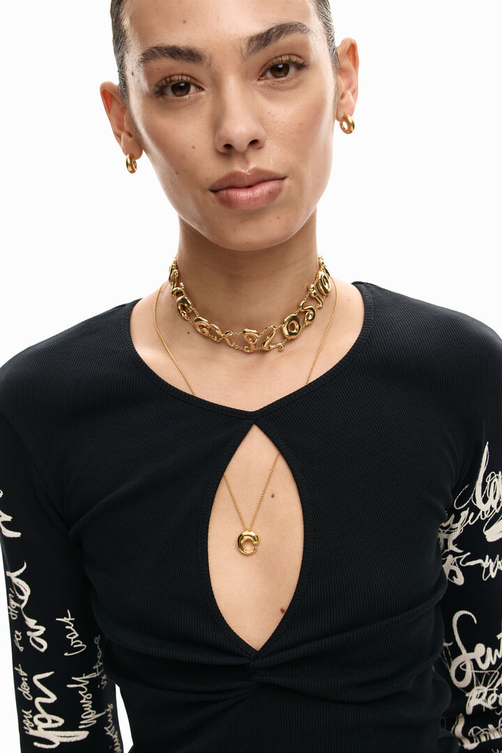 T-shirt with lettering opening | Desigual