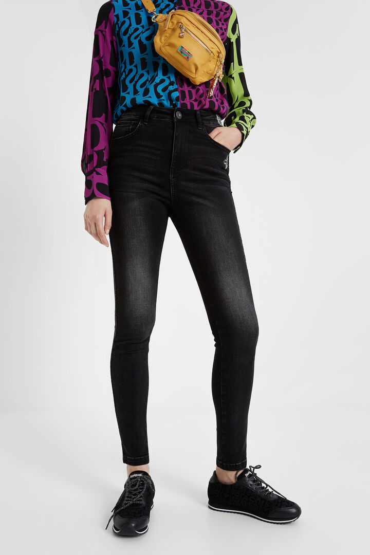 Skinny jeans with side strip and sequin details | Desigual