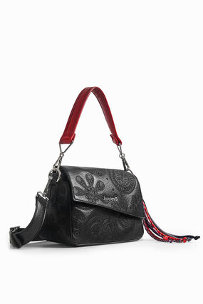Handbag flap asymmetric
